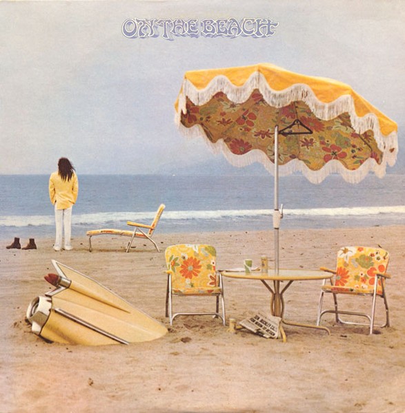 image of neil young on the beach