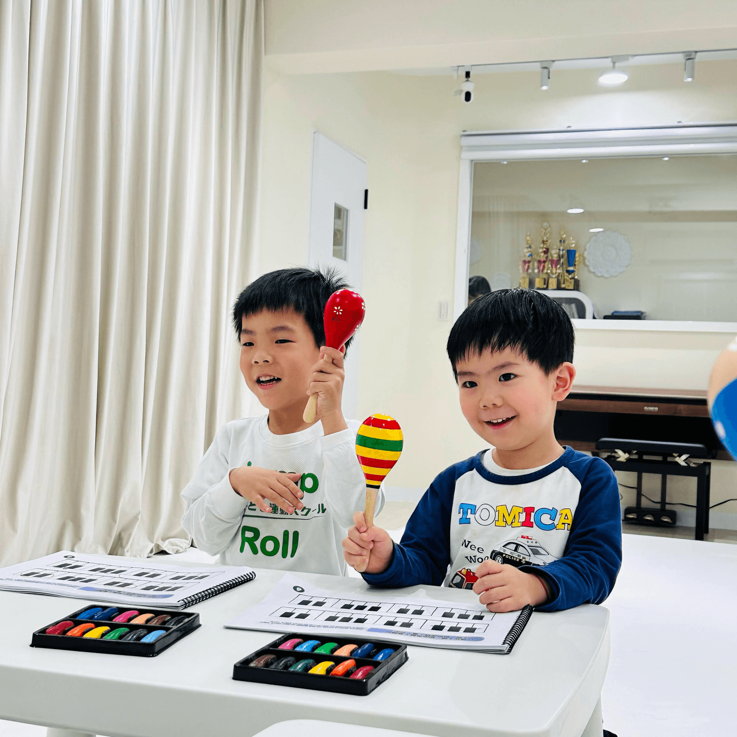 Abstract glowing orange book-shaped form on a dark background