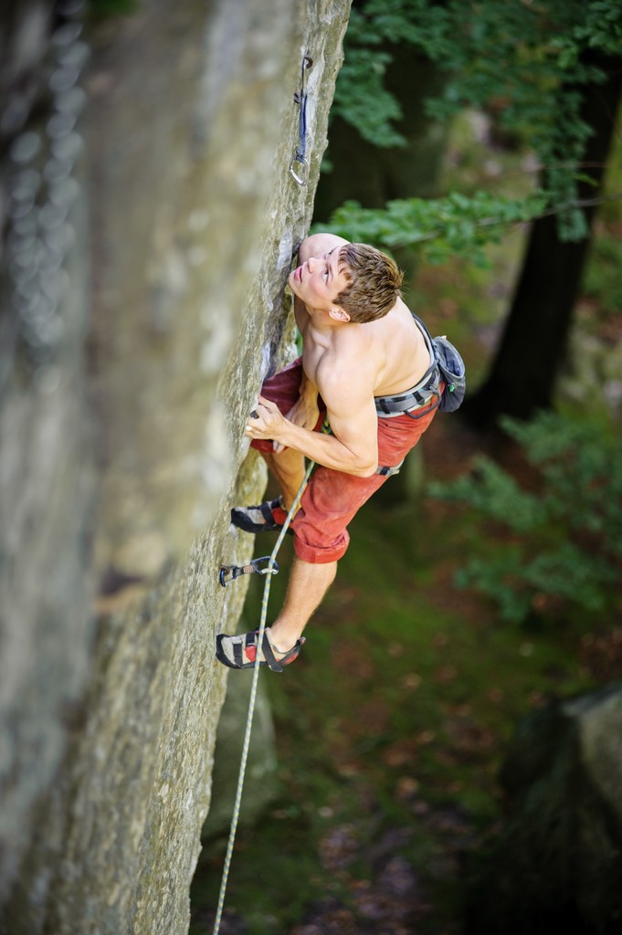 man rockclimbing