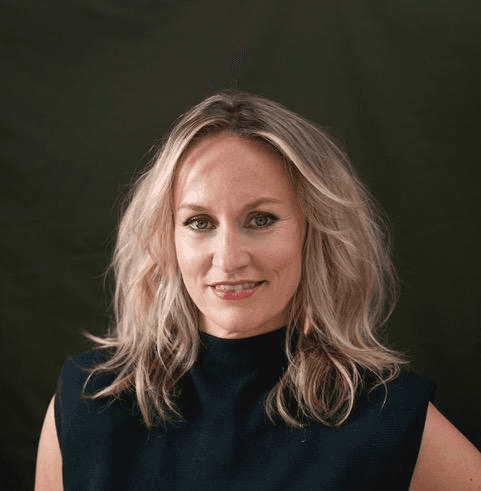 female photographer with red hair