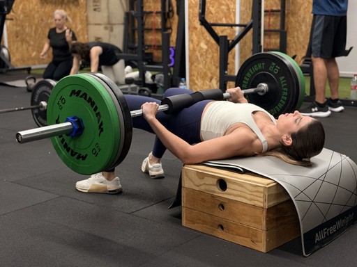 woman lifting barbel