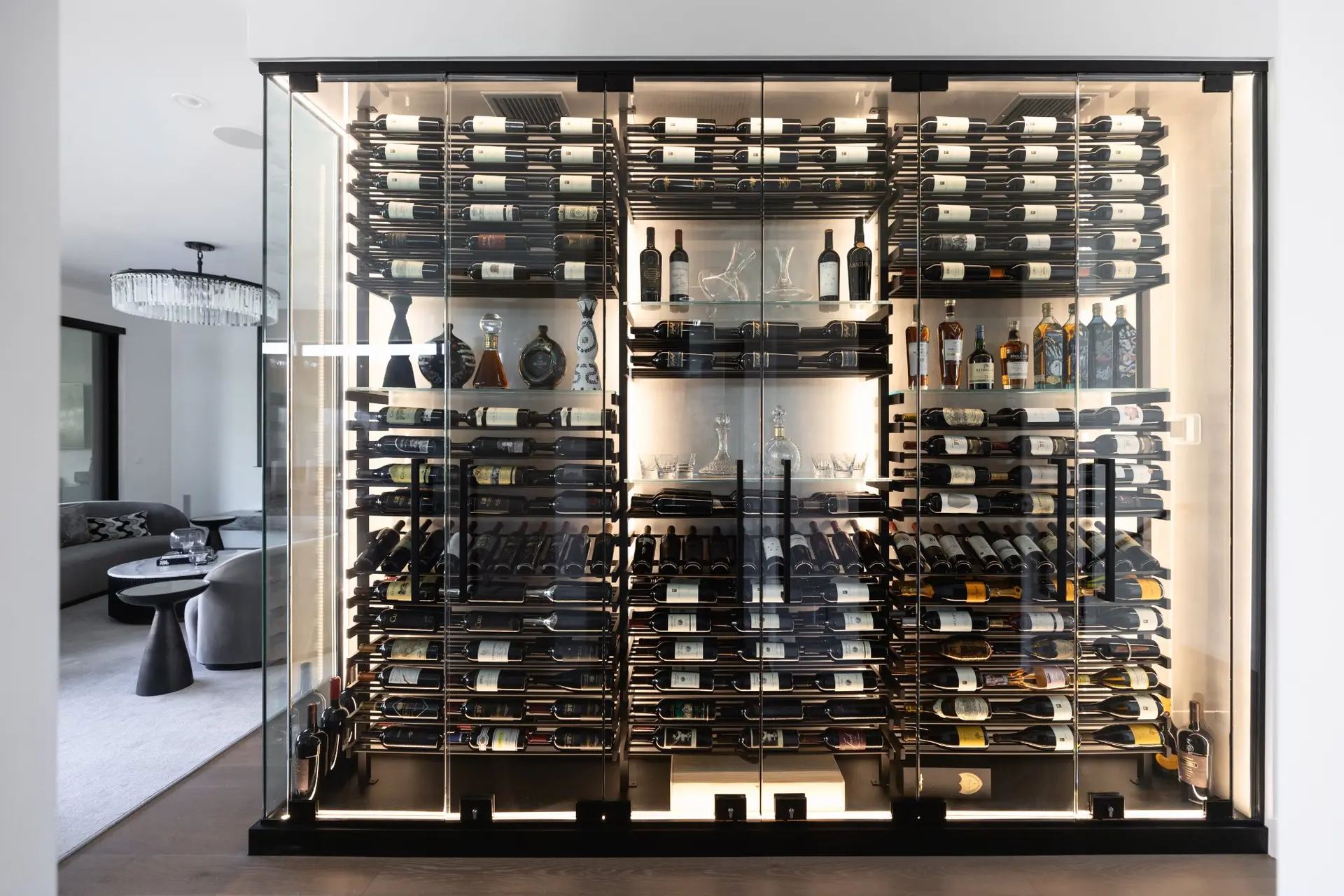 nfinity pool blending into the ocean view, minimalist sun loungers in soft neutral fabric, curved architecture