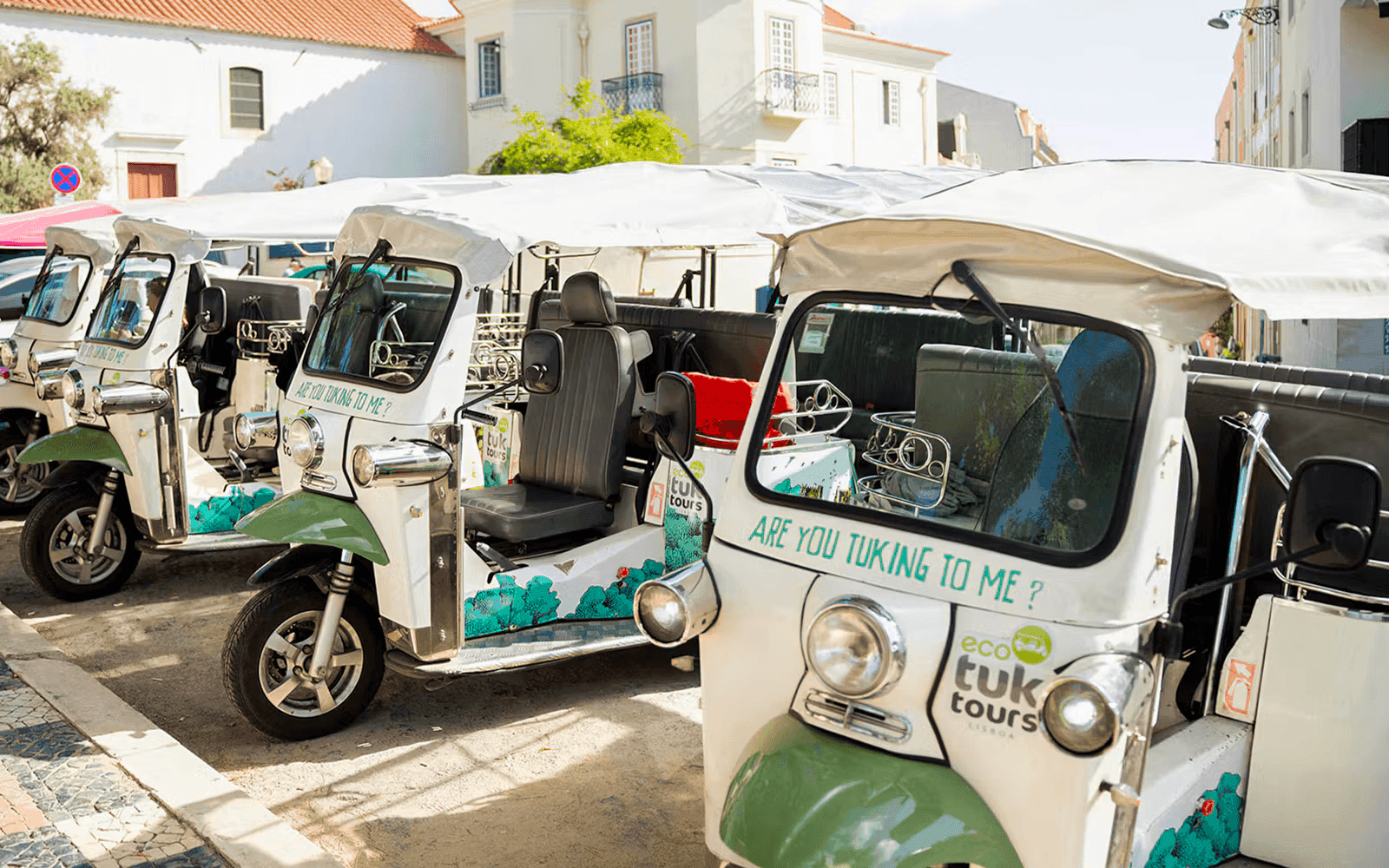 Electric tuk-tuks parked in Lisbon