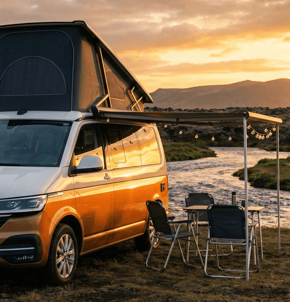 Green camper with open doors on smoky, rocky terrain.