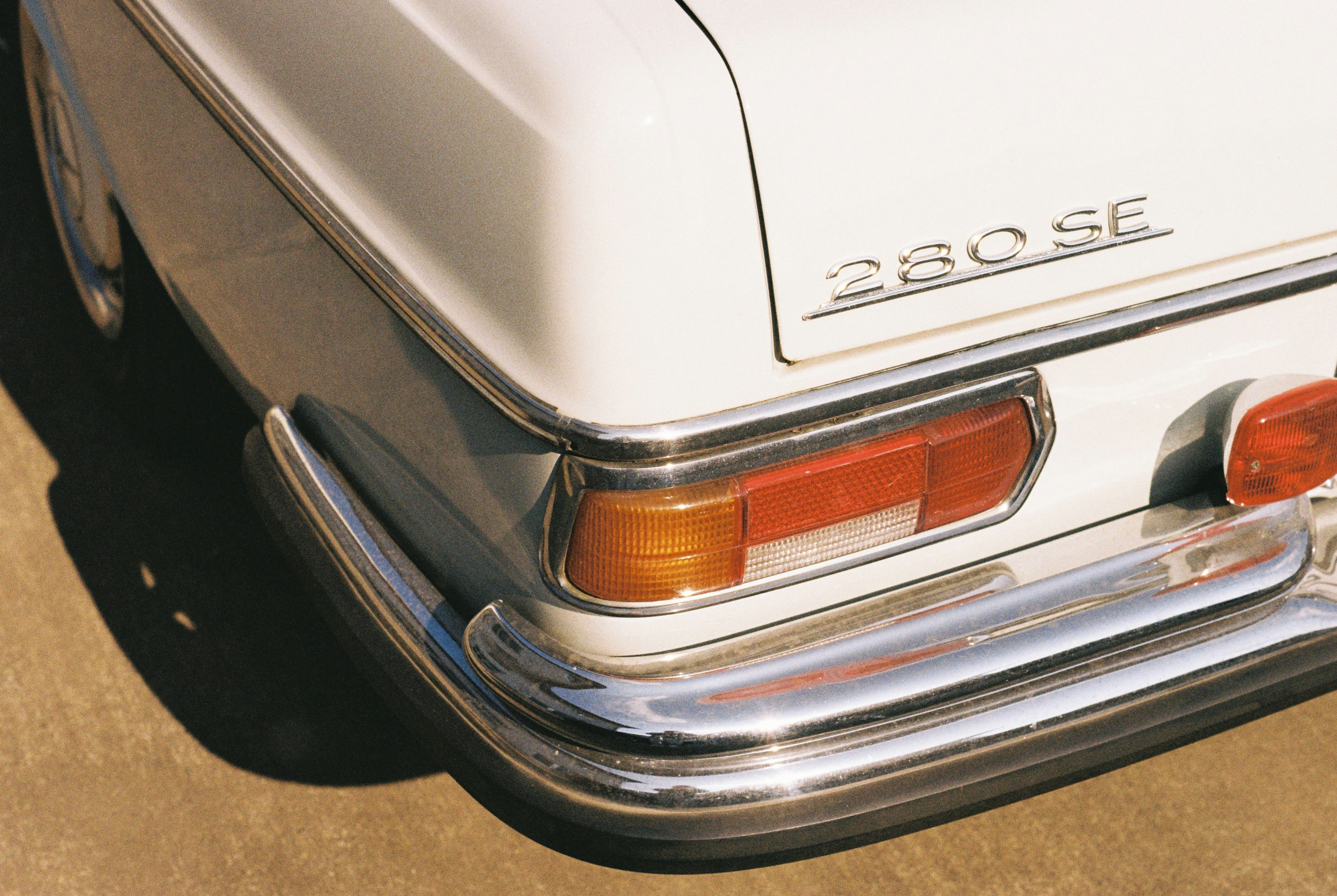 Close-up of a classic white mercedes-benz 280 se