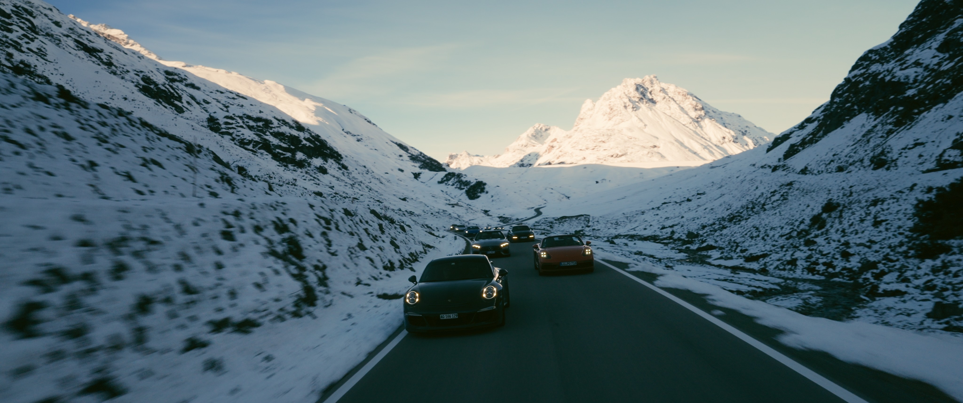 Streetside billboard with flyposters of the Batch.Works brand and illustrations