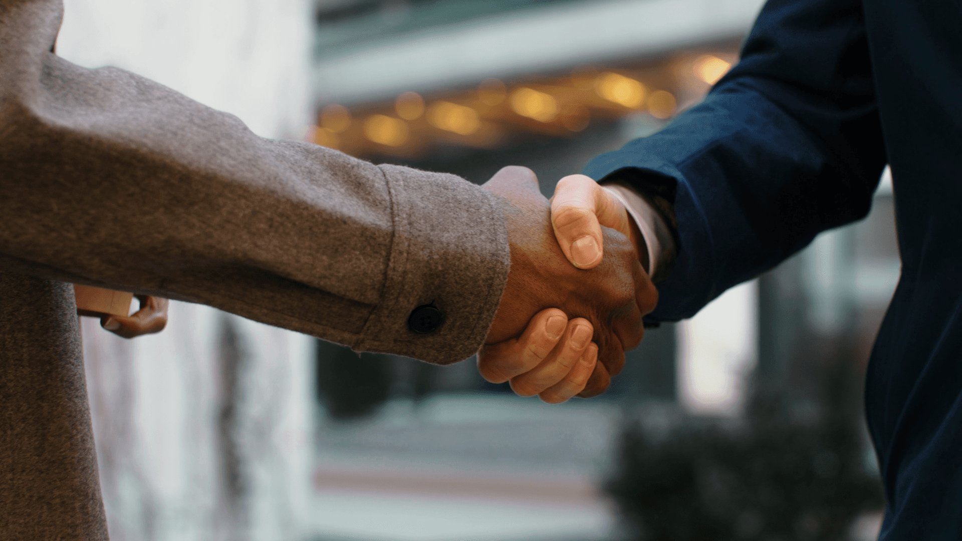 Two men shaking hands.