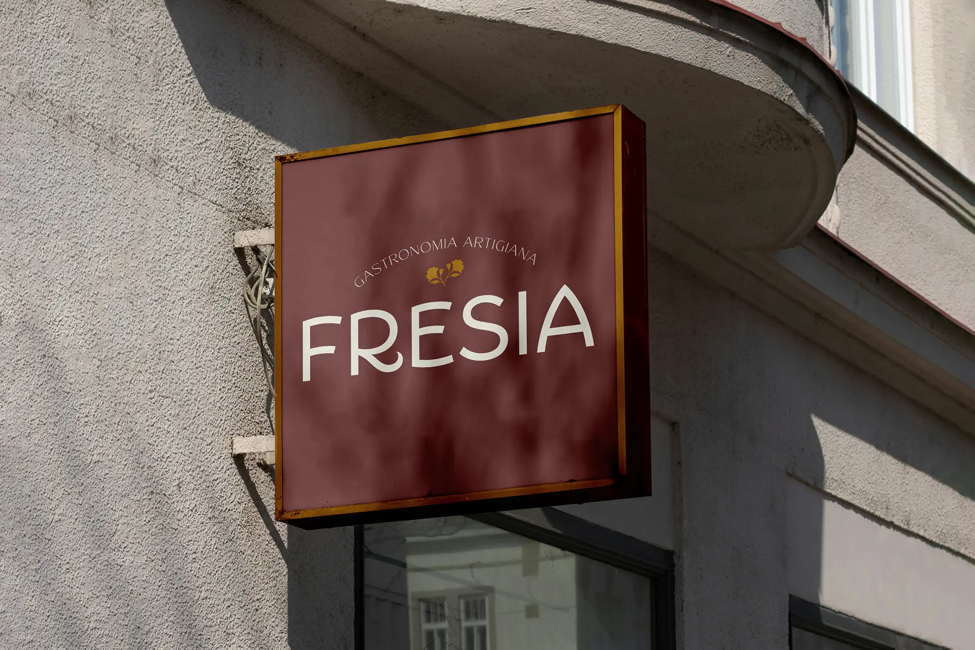 photo of a restaurant sign with the typographic logo of Fresia
