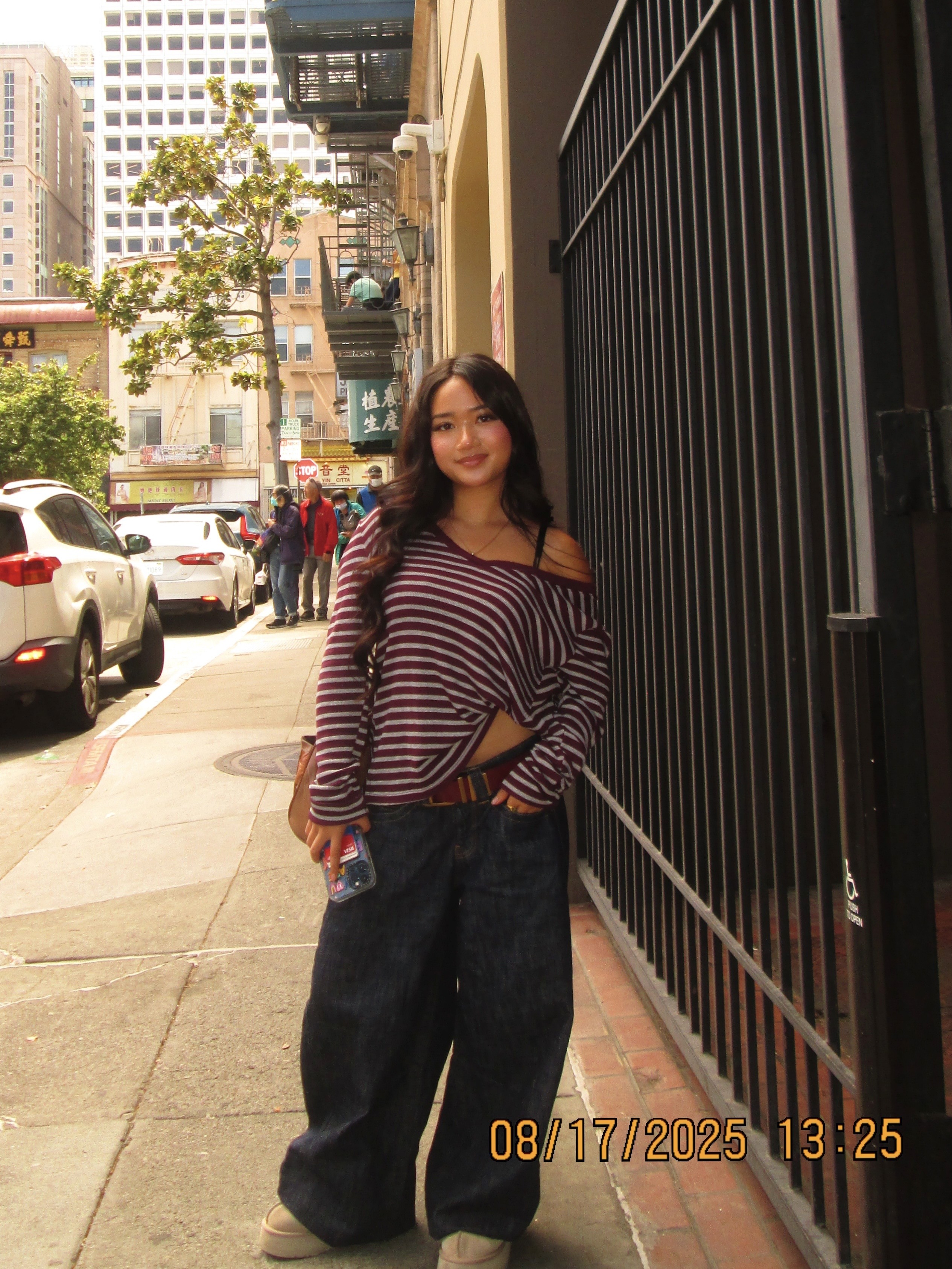 a blurry photo of a person standing in front of a wall