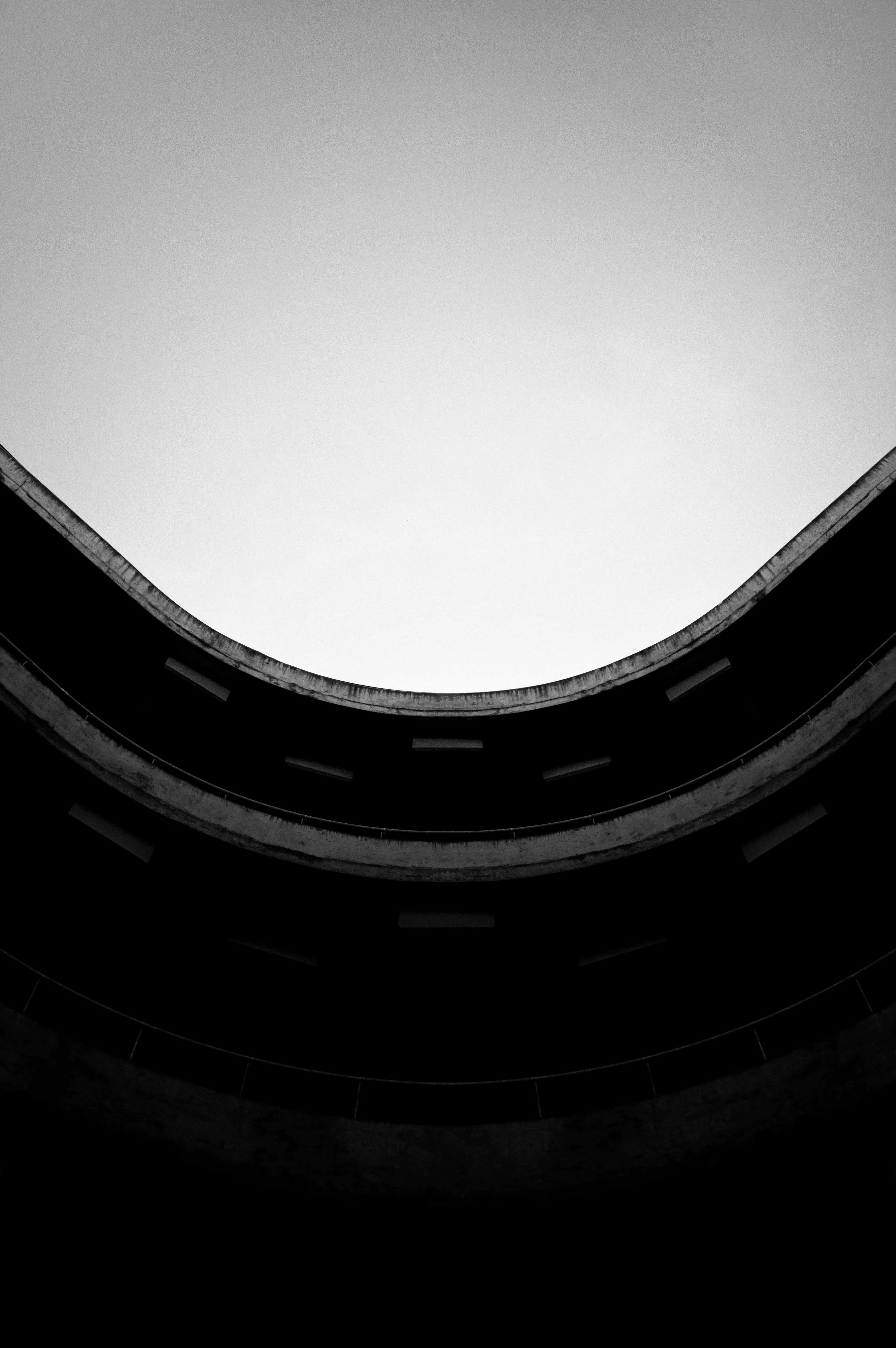 a black and white photo of a clock tower