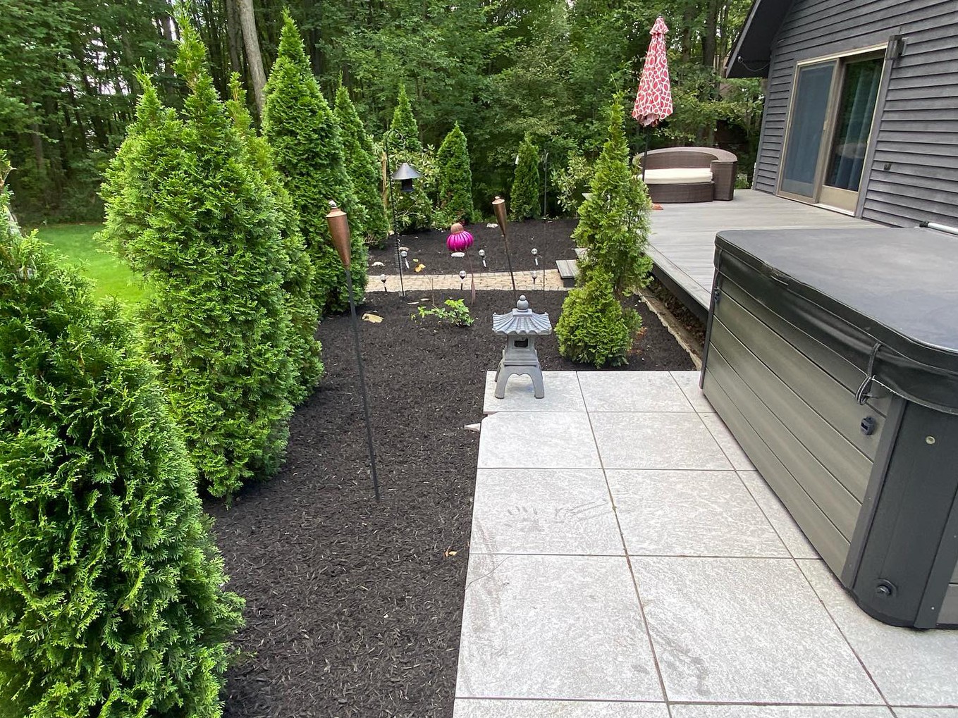 New mulch surrounding a patio