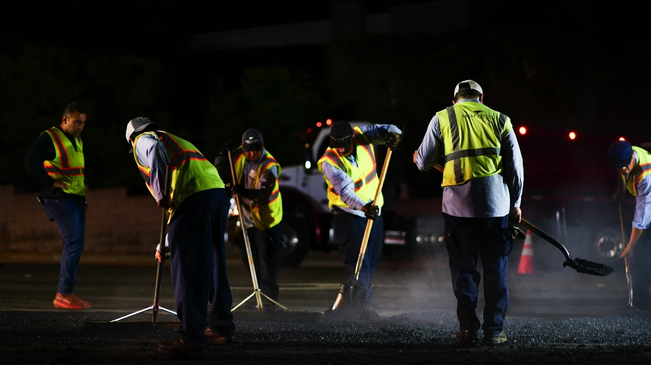 Asphalt crew hard at work on night project