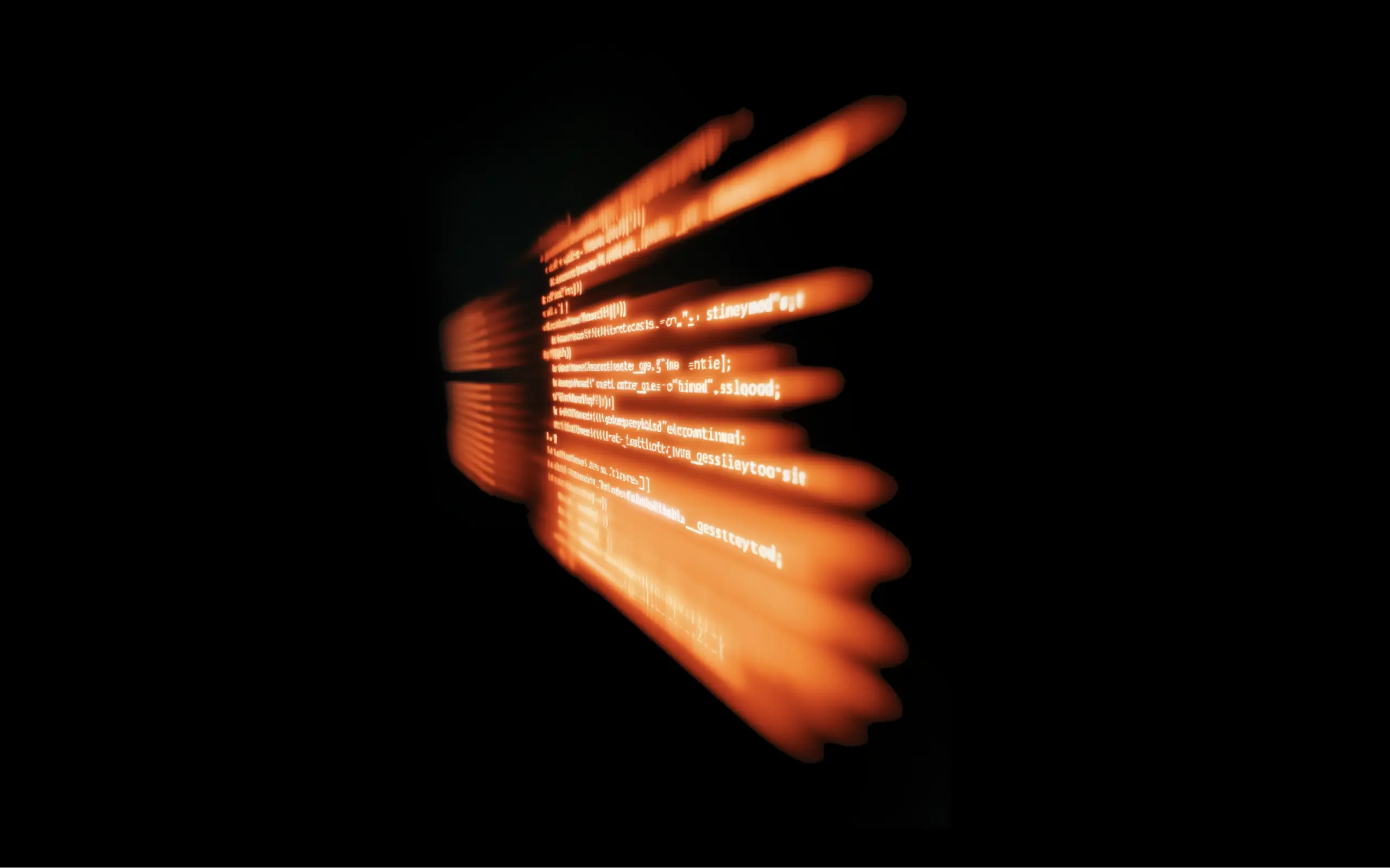 Abstract orange computer code streaks glowing against a black background with a motion blur effect.