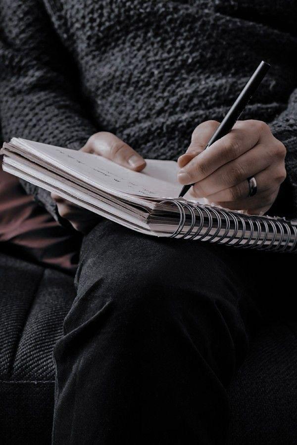 man sitting beside woman looking at a contract on DocuSign