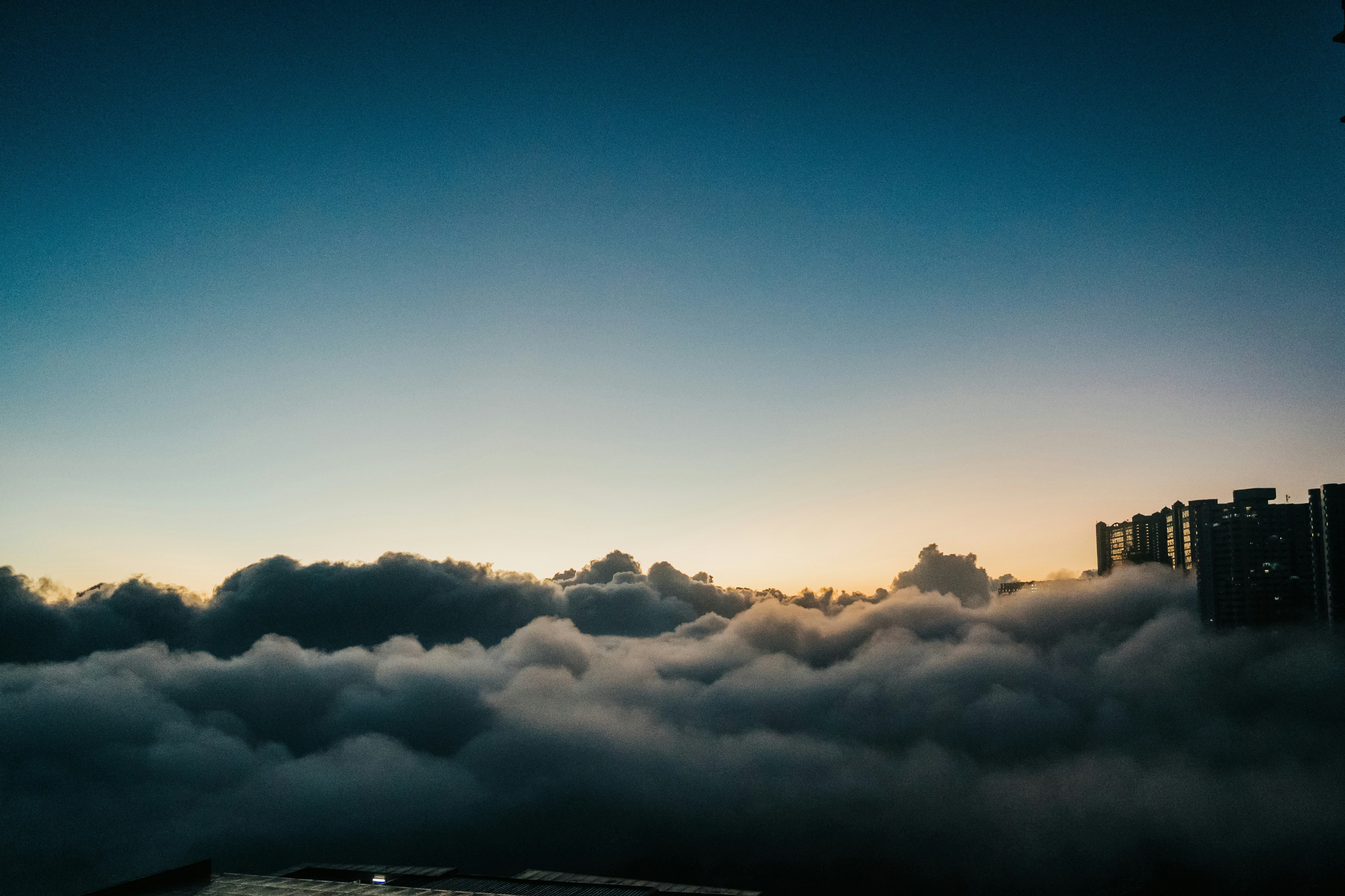 clouds over city during daytime