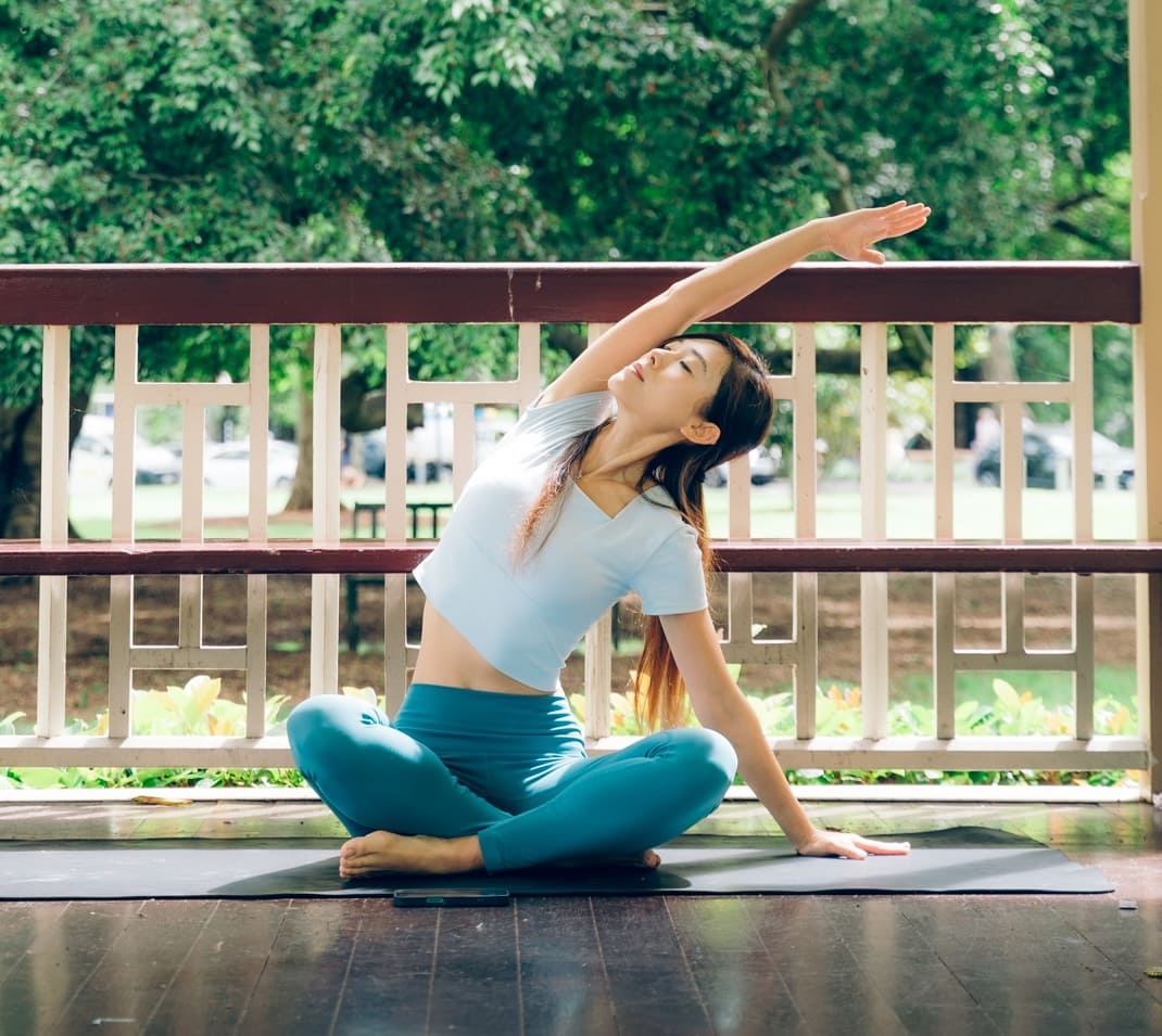 Female yoga instructor performing a yoga pose