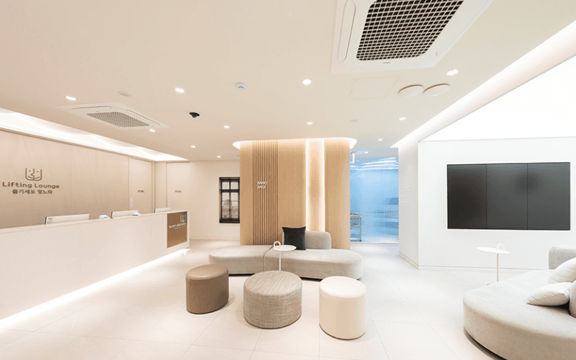 doctor conducting operation at patient in operating room