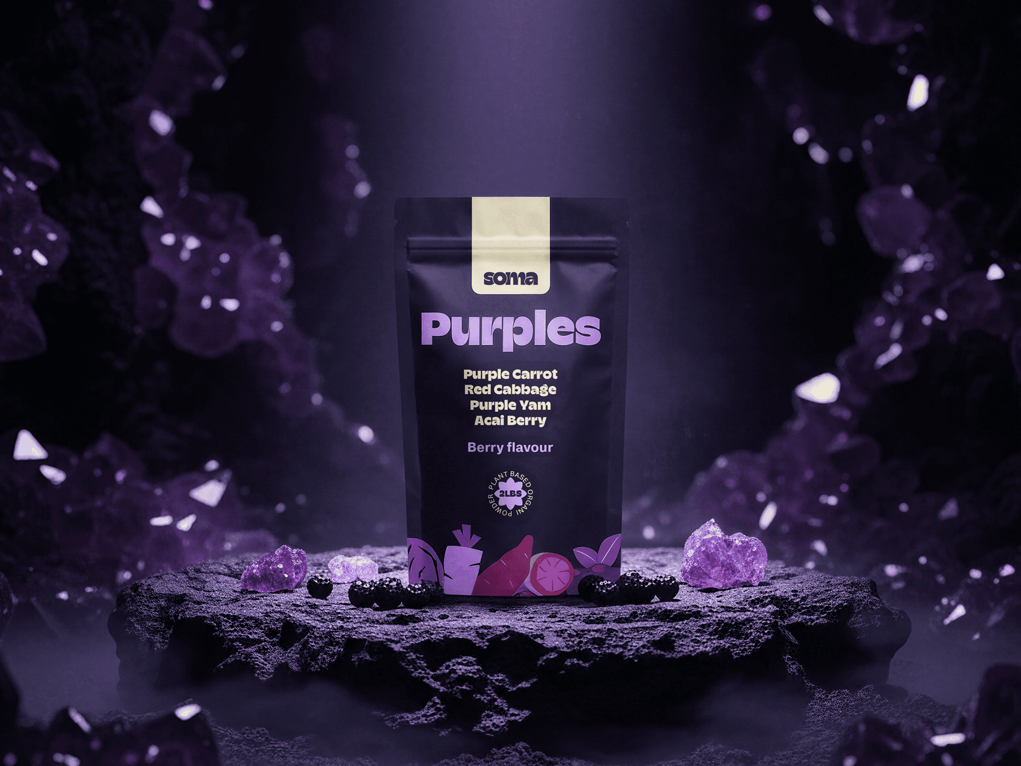 A dark matte stand-up pouch for "SOMA Purples" supplement, featuring lilac typography. The packaging rests on a rugged black stone in an atmospheric, misty cave setting, illuminated by glowing purple crystals and surrounded by scattered fresh blackberries.