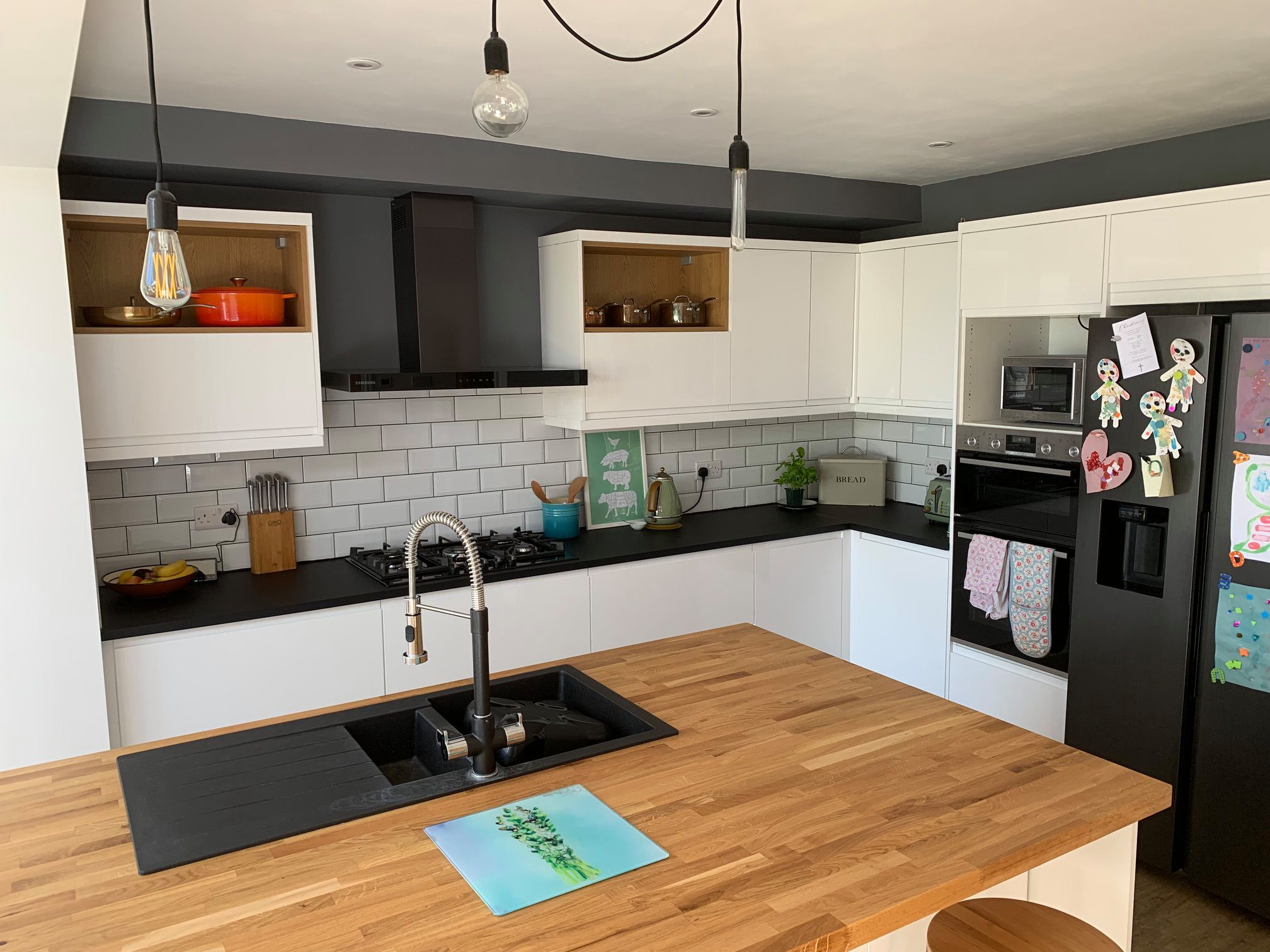 person pressing white wall