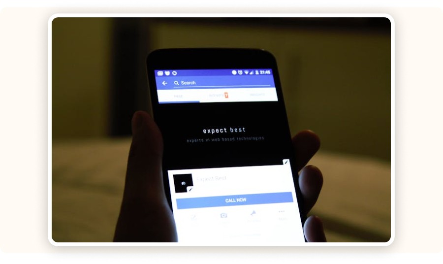 Hand holding a smartphone