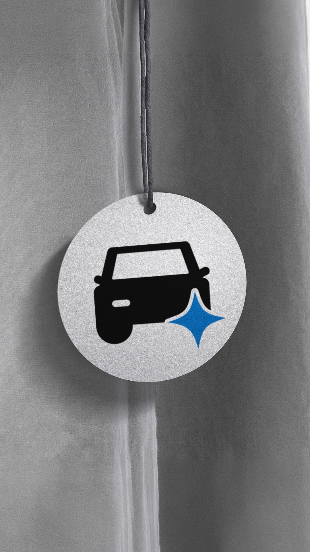 Autocollant rond Classclean avec pictogramme de voiture et éclat bleu pour symboliser le nettoyage automobile.