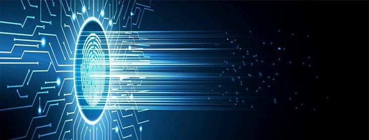 A person walks in front of large stone arches with dark doors, flanked by tall columns, in a historic building.