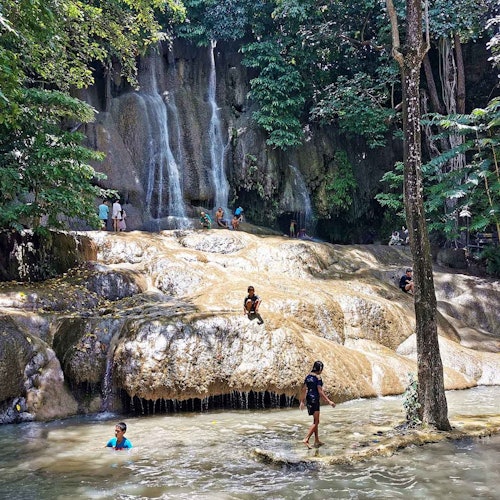 Relax and enjoy a lunch next to the waterfall.