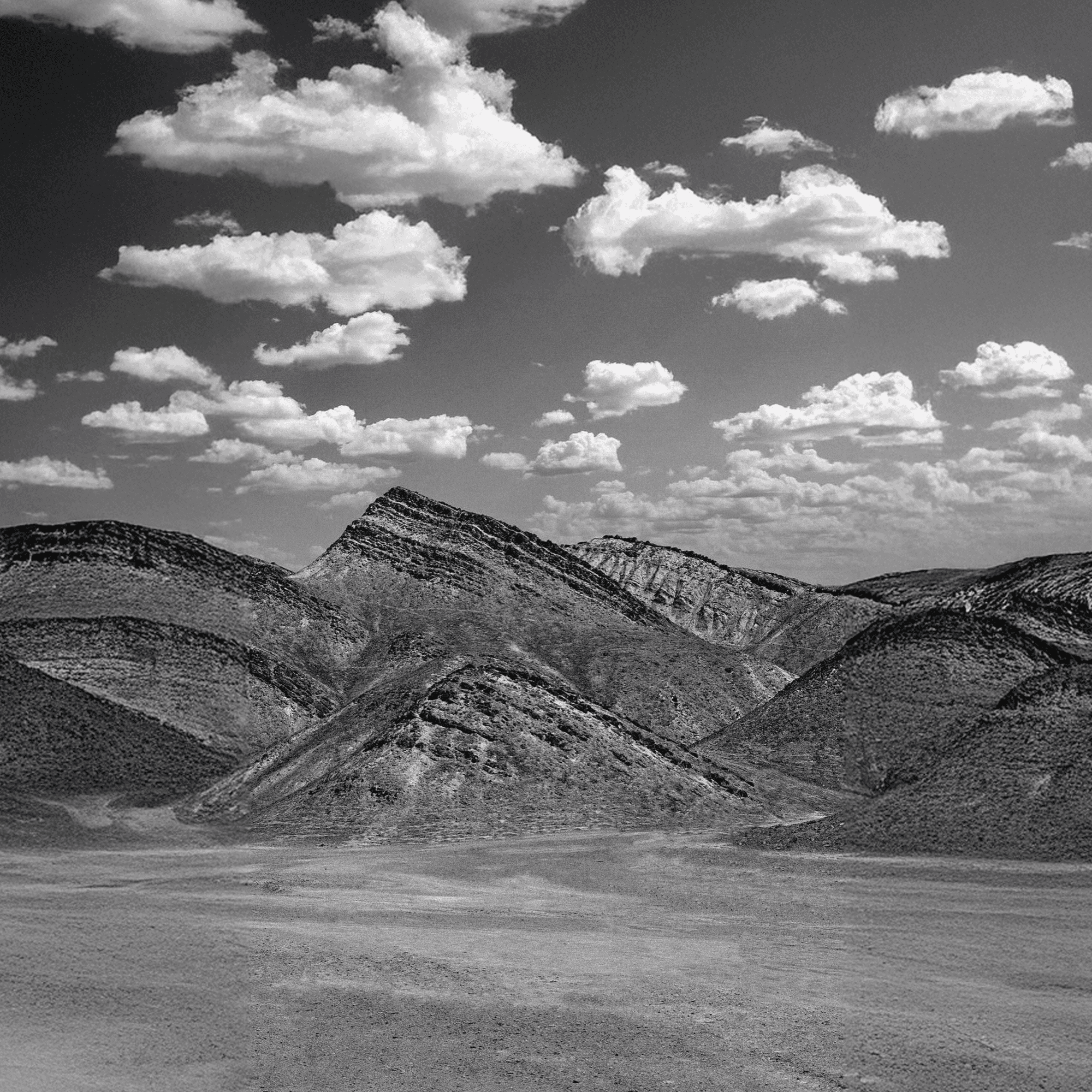 Navigation icon, mountain range with clouds