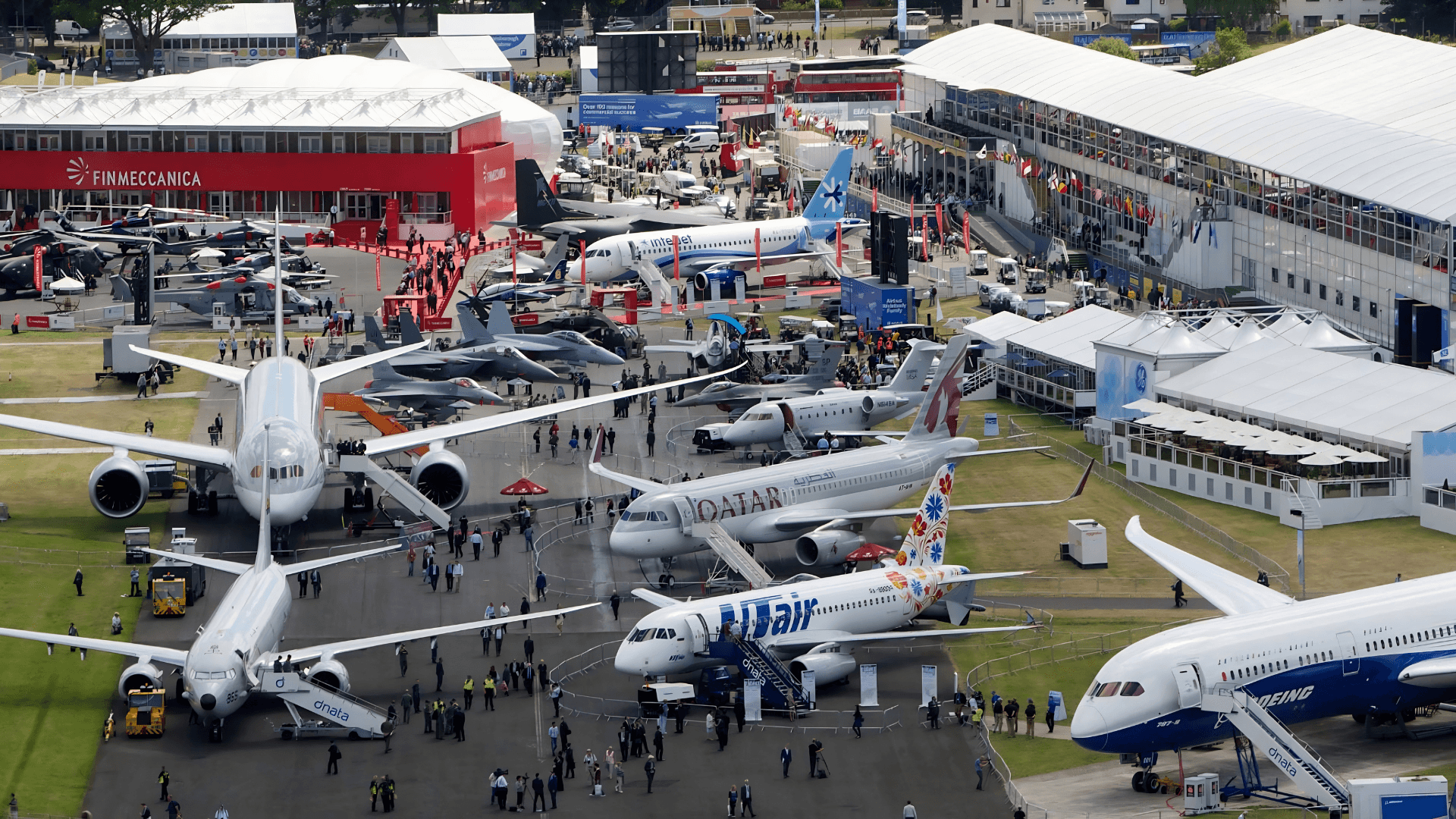Aircraft and aerospace companies exhibiting at an international aviation trade show in Farnborough.