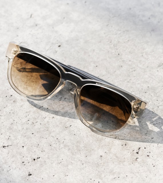 Sunglasses on concrete.