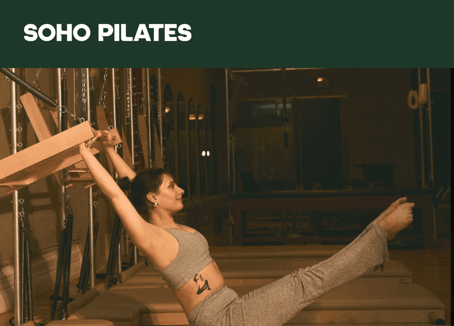 Interior of SoHo Pilates' Classical Pilates studio in Manhattan, showing reformer equipment and studio space.