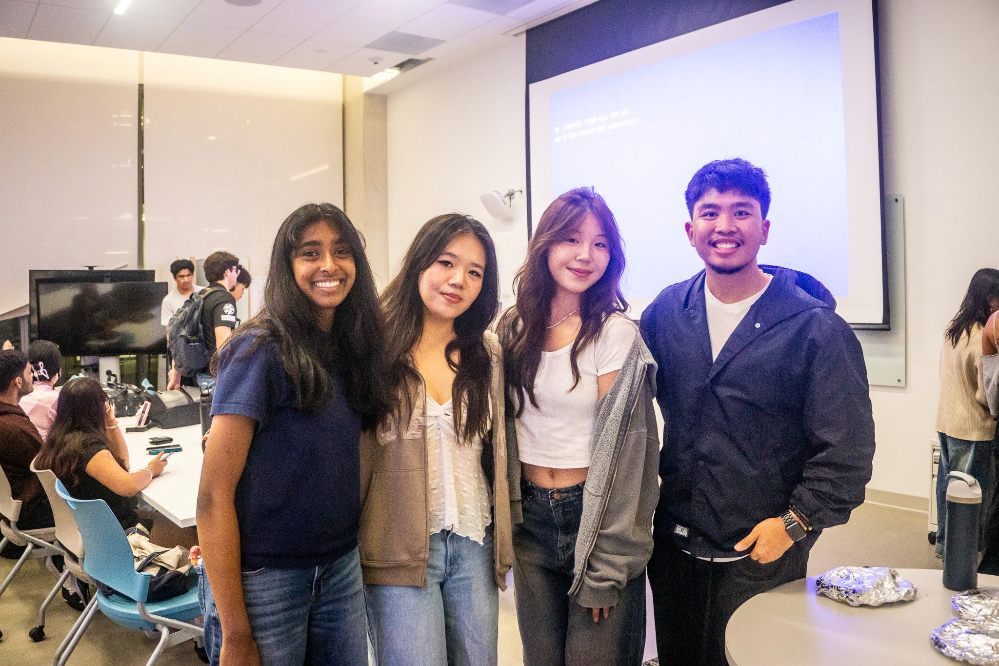 A man stading with Surfboard