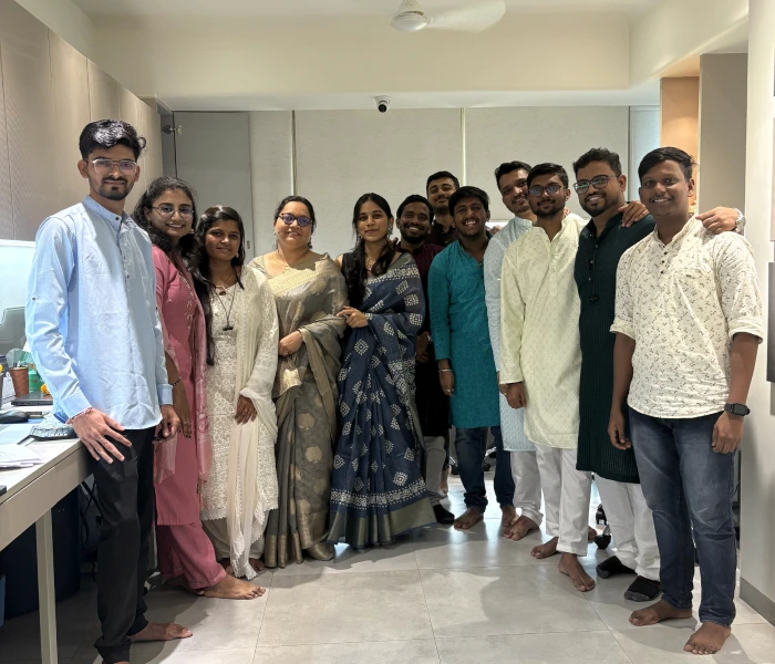 The image is from Instalogic, business intelligence solutions, showing a joyful team gathering.