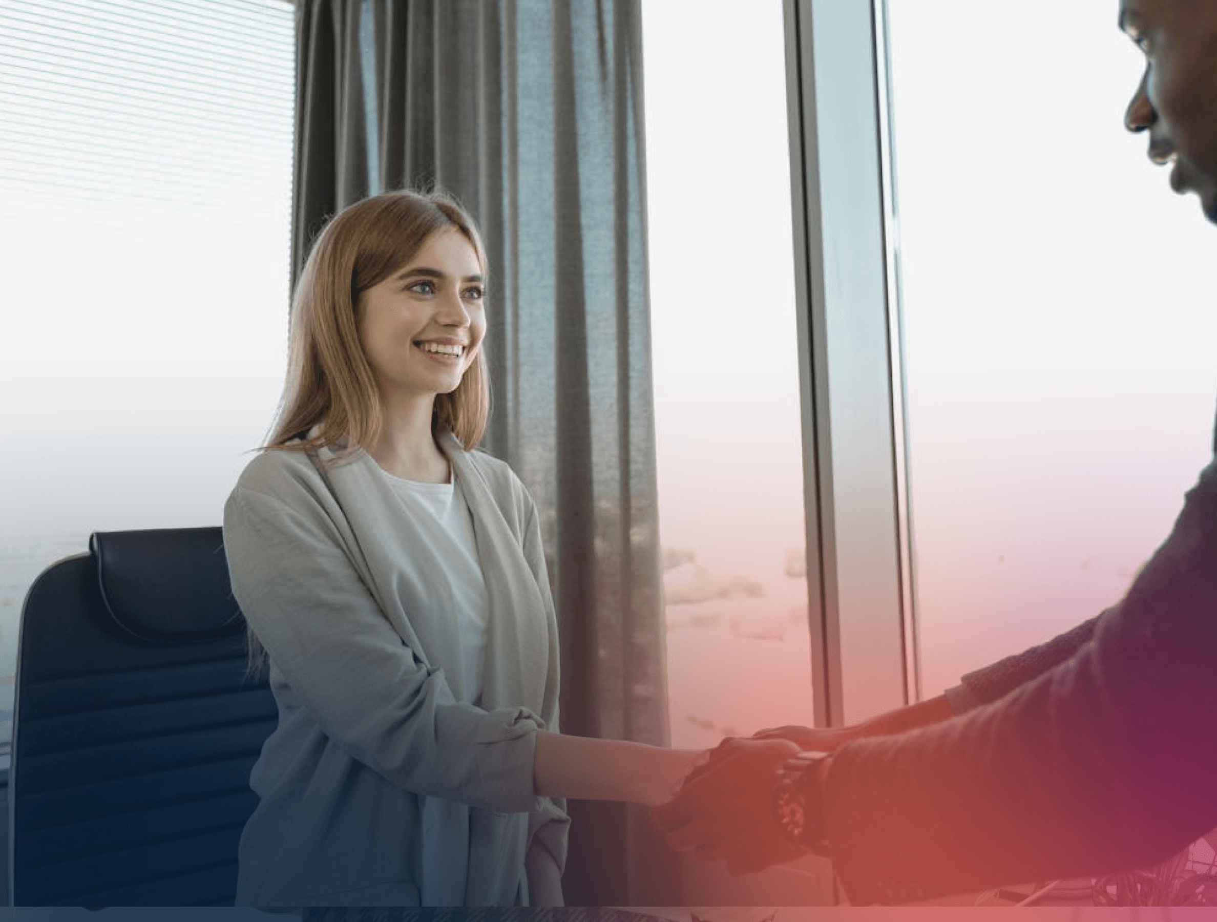 Business woman shaking hands with man