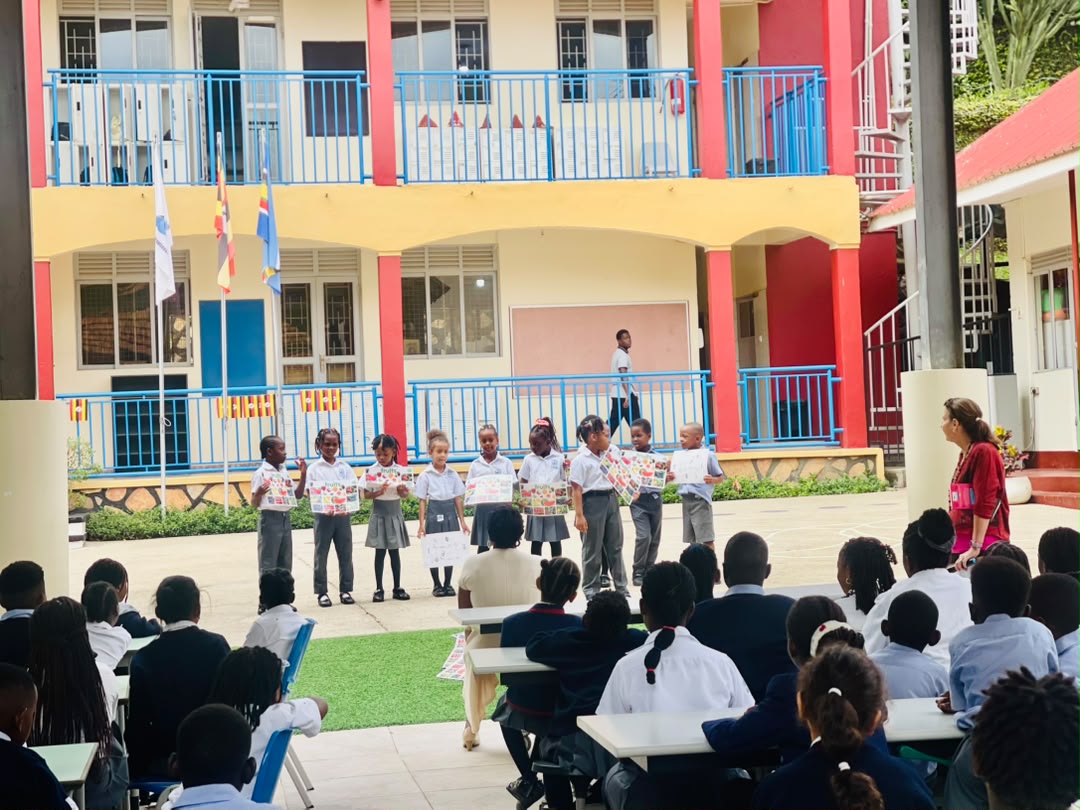 A school building stands against the backdrop of a clear sky