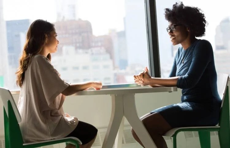 Woman being interviewed