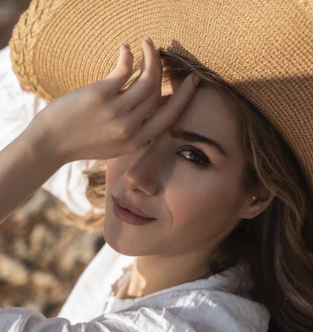 Woman in brown hat