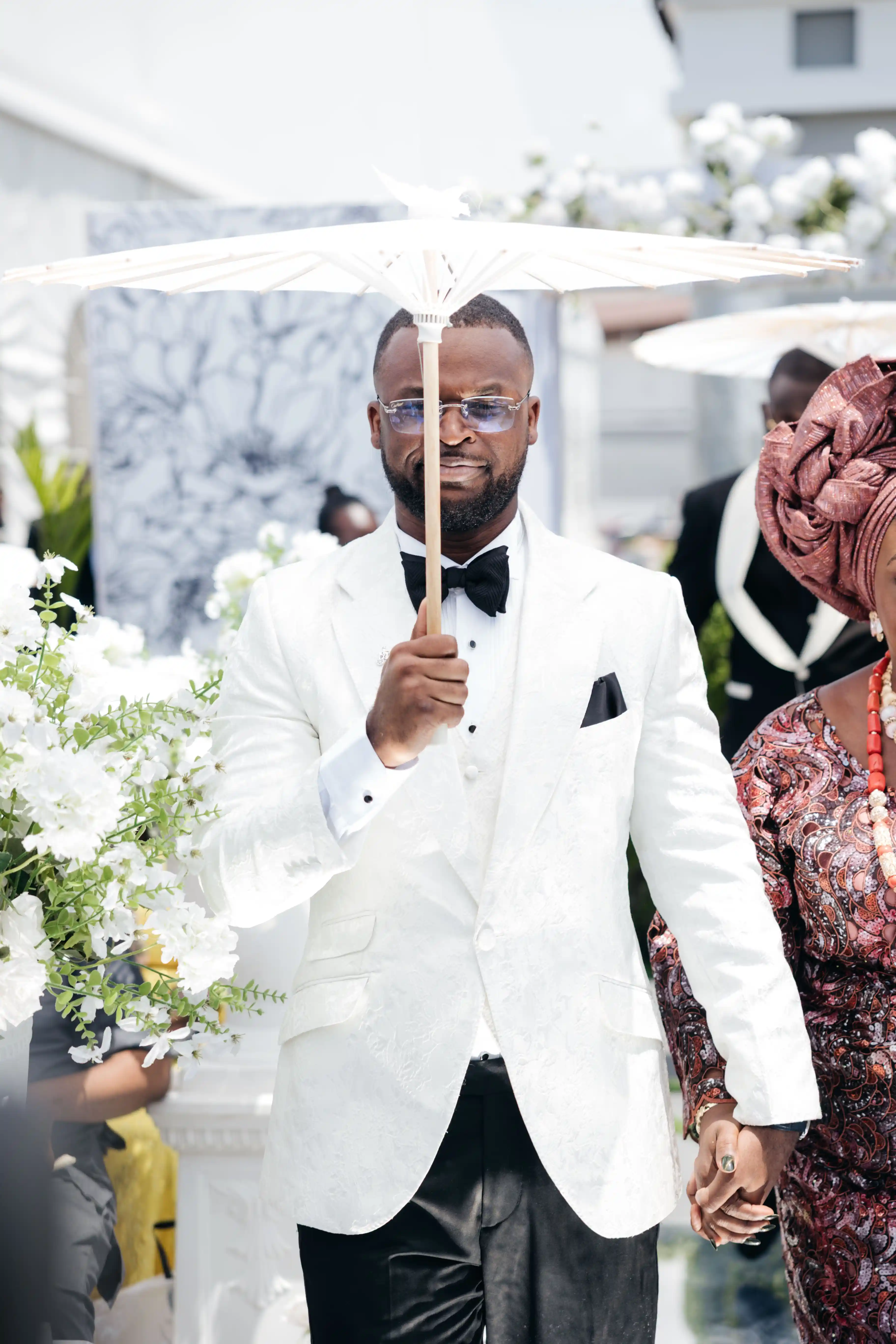 Bride and groom celebrating a luxury wedding coordinated by Victoria Brooks Events, a premium wedding planner in Nigeria.