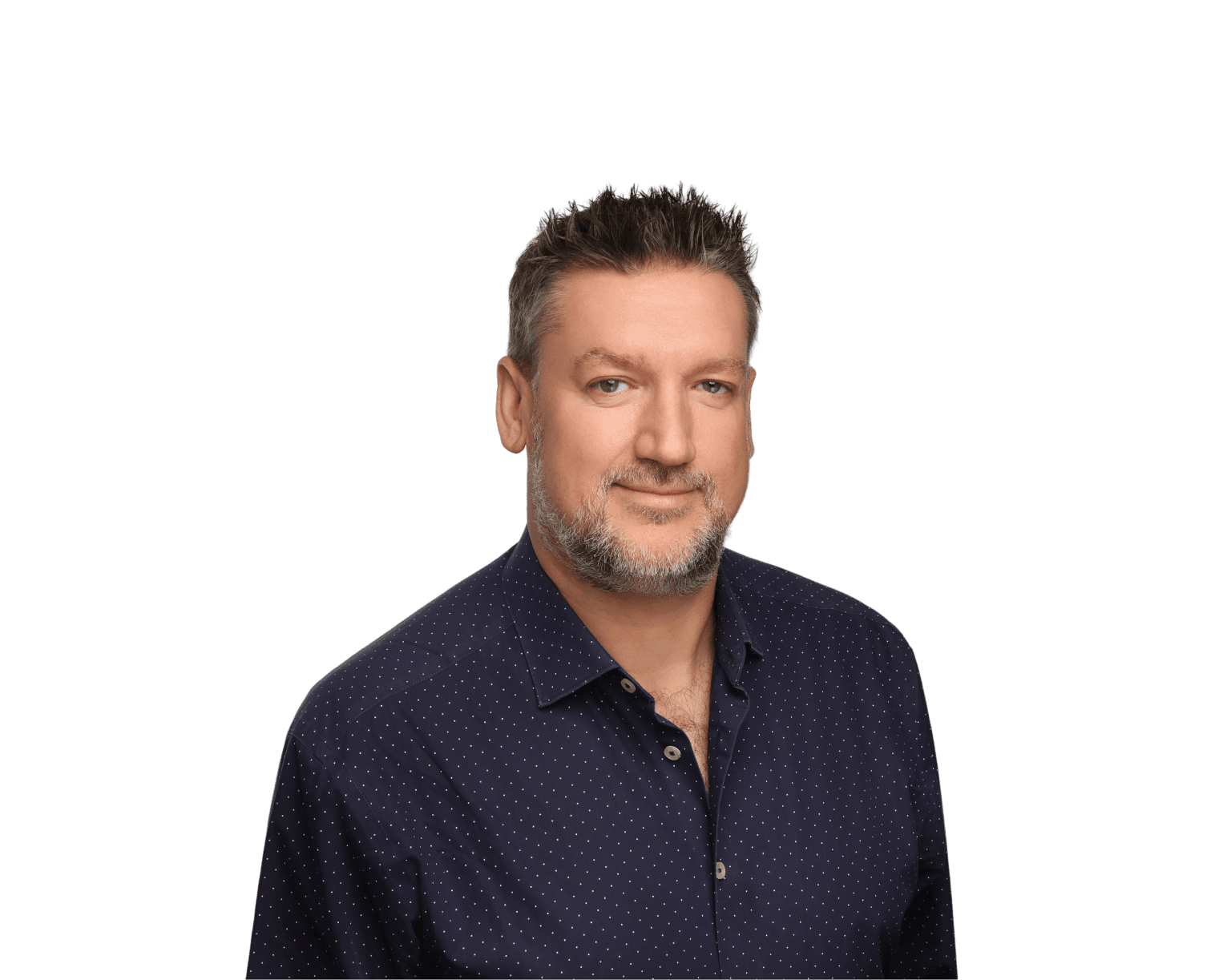 Tom Chamberlain, Chief Customer Officer, smiling with a casual yet professional appearance.