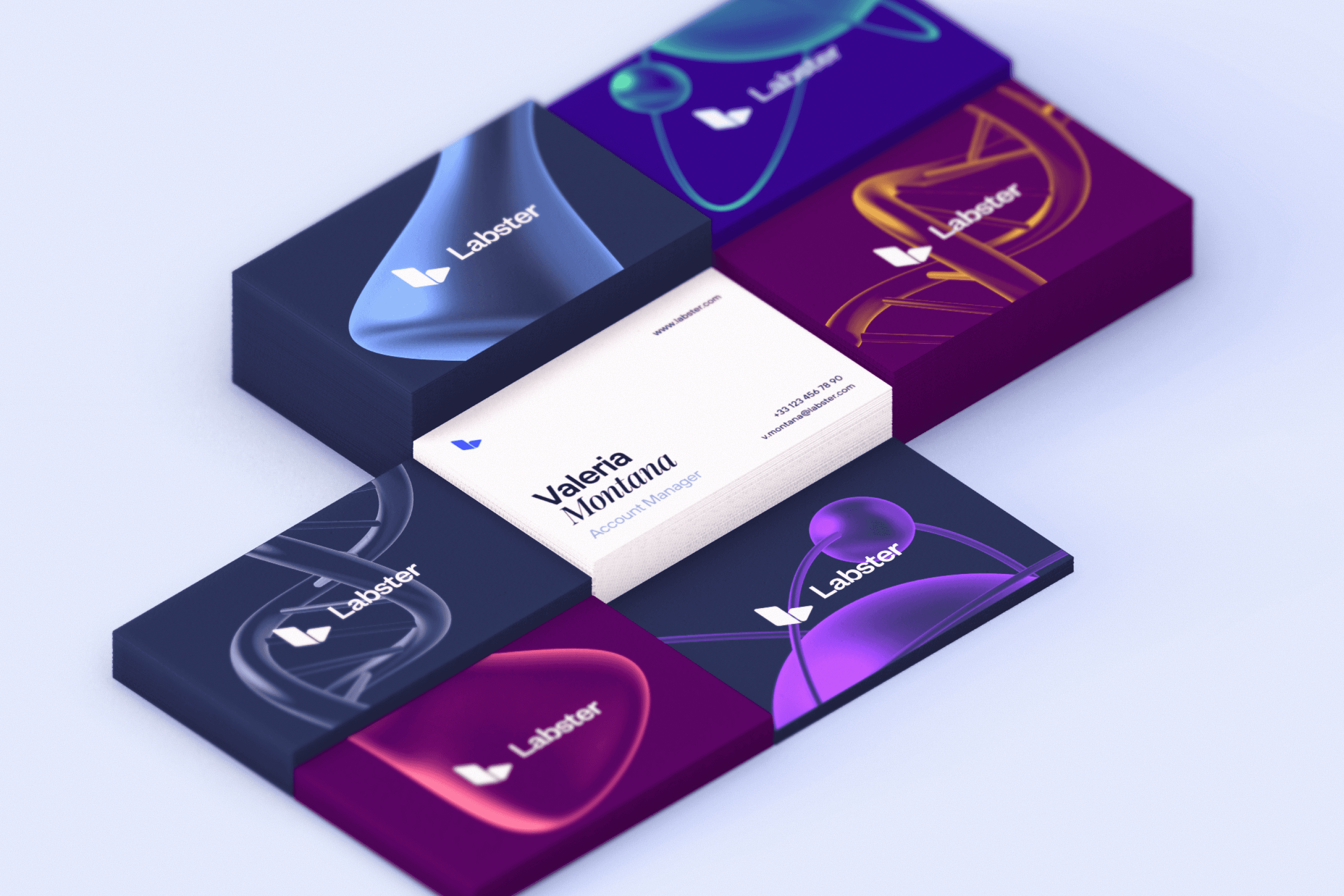 Mockup of several piles of business cards using the new Labster brand.