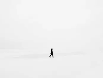 person walking on snowfield
