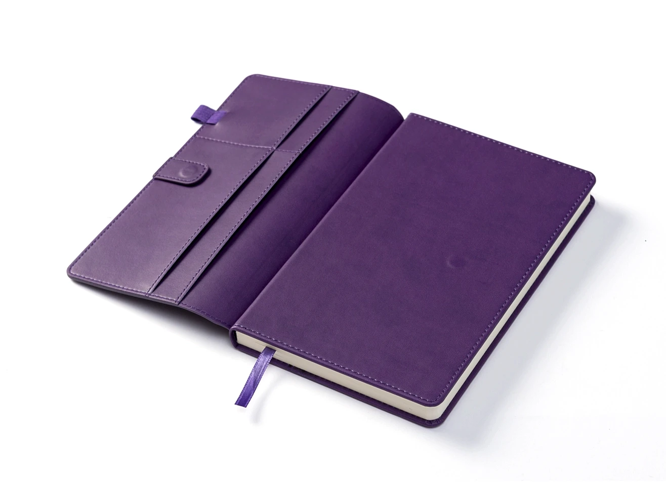 Open cover revealing interior card slots and notebook insert.