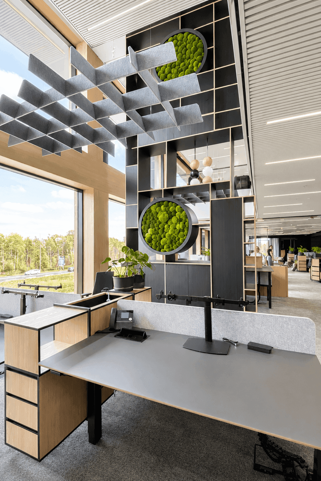design boekeknast twee kantoorverdiepingen hoog