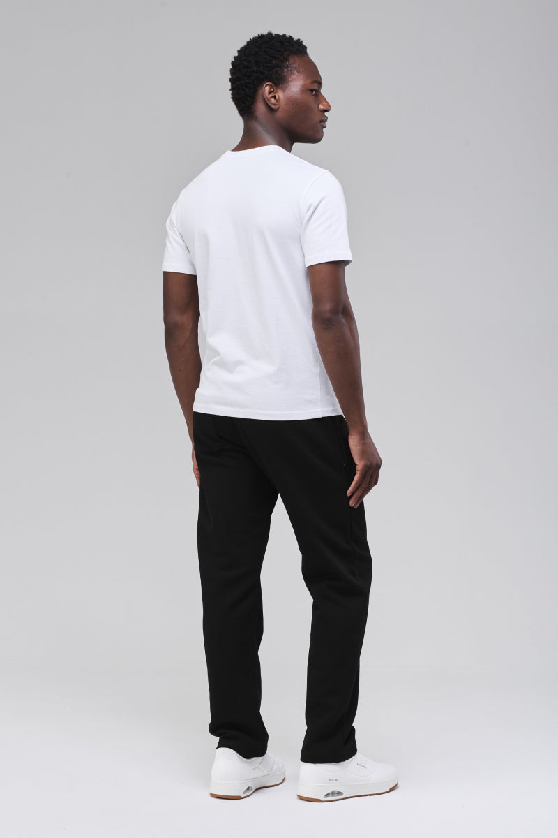 Black heavyweight cotton, unisex sweatpants, angled back view