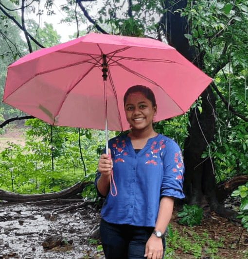 A young girl smiling