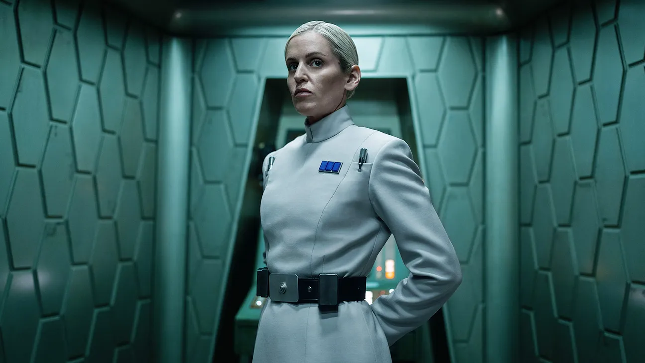 Denise Gough as Dedra Meero in 'Andor', wearing an Imperial uniform with a stern expression.