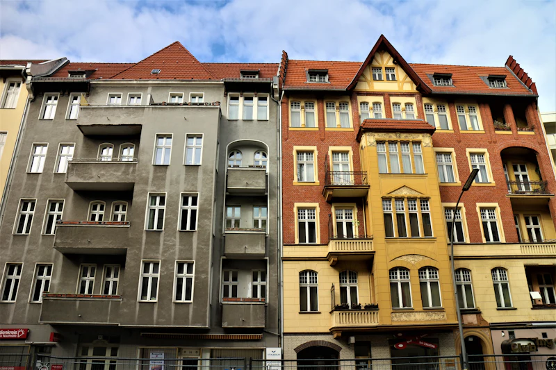 Old Berlin apartment buildings with balconies and gabled roofs