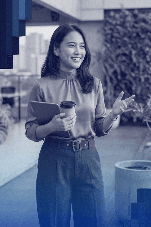 woman sitting around table holding tablet