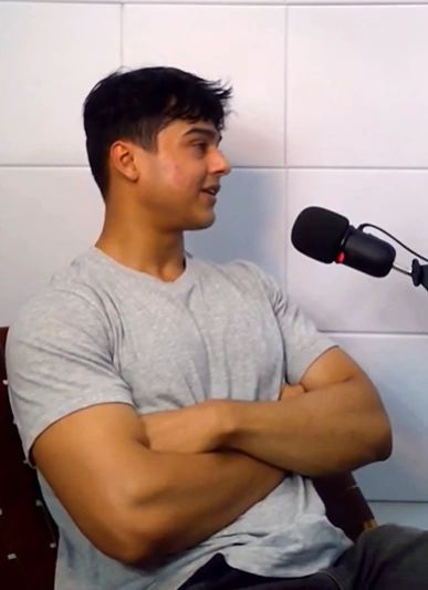 a black and white living room with a large tv