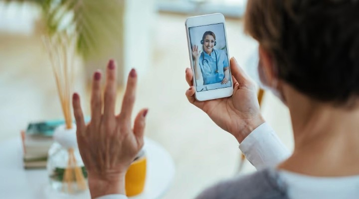 close up of woman in virtual health meeting